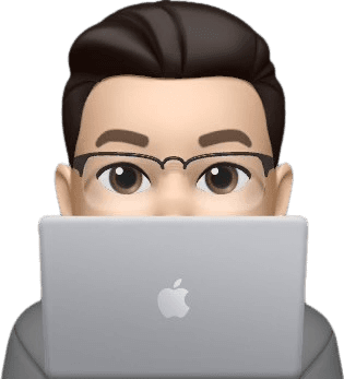 Person peeking behind laptop